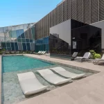 Rooftop infinity pool with Dubai skyline views at DaVinci Tower
