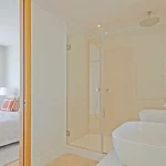 Duplex Penthouse Eixample Barcelona | Prime Address 22 Duplex Penthouse Barcelona Eixample by Prime Address Monaco 25 Master bathroom in luxury Barcelona penthouse