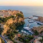 Entire 510 sqm Historic Trophy Building in Monaco-Ville | Prime Address 2 MonacoVille by Prime Address Monaco 7a Elevated panoramic view above Monaco-Ville rooftops with sea horizon