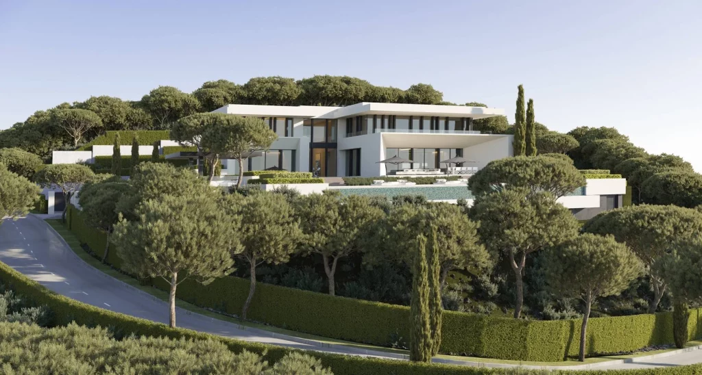 Woodland Marbella Villa | Private Luxury Villas in Benahavís 15 Villa Forest Bay Marbella by Prime Address Monaco 2 Villa Forest Bay Marbella exterior with contemporary architecture and panoramic mountain views